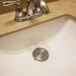 3rd image of Bathroom Sink/Bathtub Hair Catcher & Drain Protector in Brushed Nickel (2-Pack)